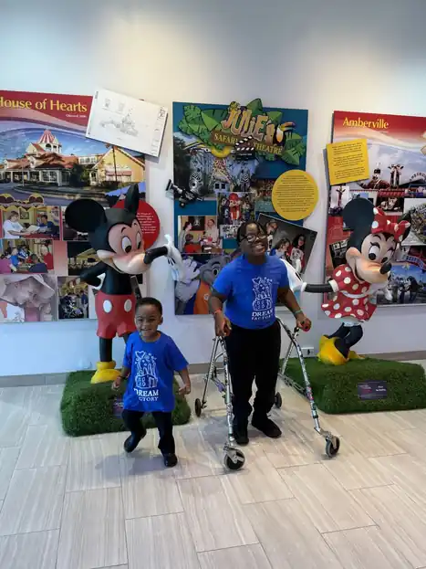 Kaydon with Mickey and Minnie at Give Kids the World Village